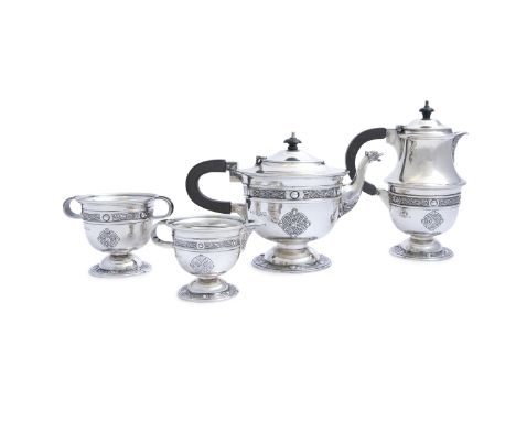 AN IRISH CELTIC REVIVAL FOUR PIECE TEA AND COFFEE SERVICE, Dublin 1966, mark of Alwright &amp; Marshall, comprising a teapot,