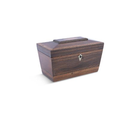 A 19TH CENTURY INLAID ROSEWOOD RECTANGULAR SARCOPHAGUS SHAPED TEA CADDY, the flat domed lid with inlaid boxwood and holly ova