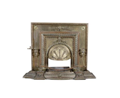 A VICTORIAN BRASS FIRE SURROUND AND FENDER, 19th century, of rectangular outline, applied with support arms for power, shaved