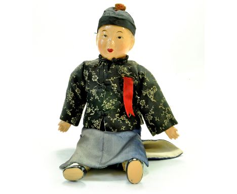 A large asian bisque type vintage doll. Chinese origin. Very Good.  Note: We are happy to provide additional images of any lo
