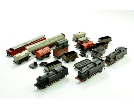 A number of tinplate issue 00 Gauge Triang Model Railway issues. Wagons and locomotives. Mostly Fair Only.  Note: We are happ