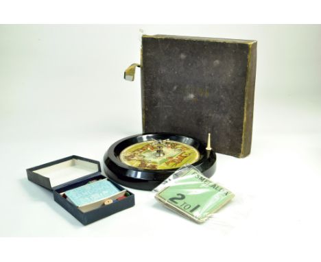An early 20th Century example of the Game of Sandown. Appears complete with wheel and other items. Box is Fair.  Note: We are