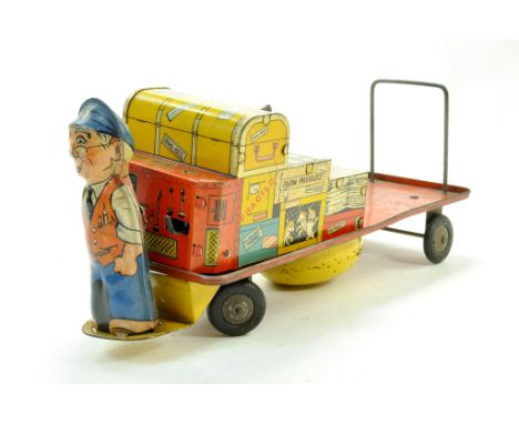 A Mettoy Mechanical Railway Porter's Trolley with Porter and Luggage. Tinplate. Working. Fair to Good. Note: We are happy to 