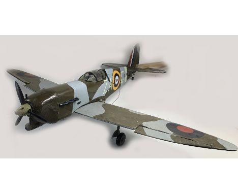 An impressive large scale Radio Controlled Model Aircraft - Spitfire - approx 1/4 to 1/8 scale. Please see additional picture