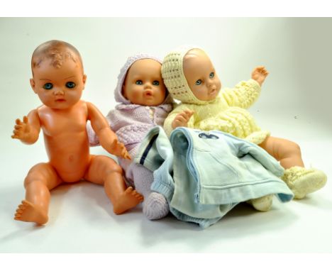 Group of large plastic baby dolls with clothing. Generally very good. Note: We are happy to provide additional images of any 