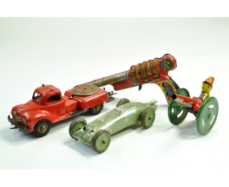 Interesting tinplate group including space gun from Marx, GAMA Fire Truck, Balloon powered racing car plus field cannon. Fair