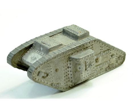 A large and vintage model of a British World War One Mark V Battle Tank. Metal Cast. Maker Unknown. Note: We are happy to pro