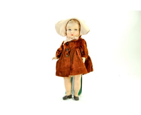 A scarce early issue, 1920's antique 15" Bisque Doll, no markings. Moulded Hair dressed in beautiful hand sewn Bonnet and Coa