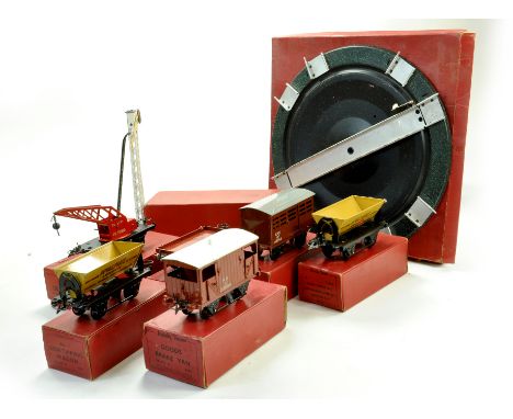 A quantity of Hornby 0 Gauge Model Railway items comprising wagons and accessory items. Generally very good to excellent, box