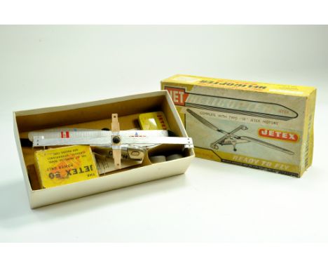 Vintage Jetex Helicopter. Whilst unchecked, the model appears predominantly complete with original box.  Note: We are happy t