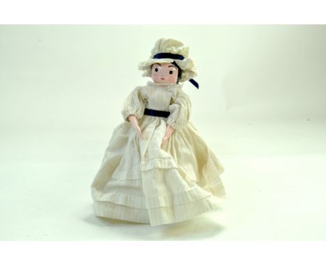 An interesting wooden peg doll, brightly presented with costume. Very Good.  Note: We are happy to provide additional images 