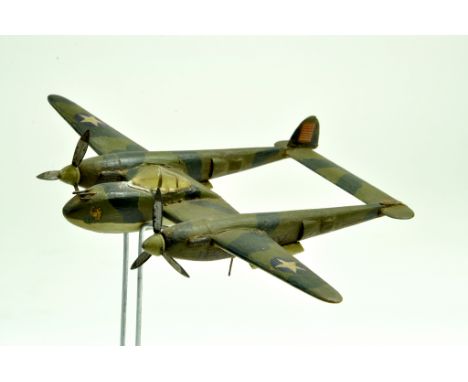 An interesting vintage scratchbuilt P38 Lightning Model Aircraft. Generally fair.  Note: We are happy to provide additional i
