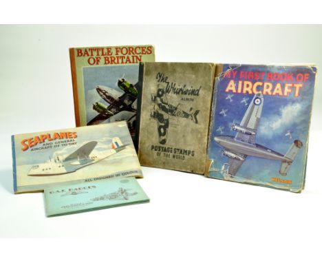 A group of vintage aircraft literature including stamp album, RAF Badges Cigarette Cards plus reference books.  Note: We are 