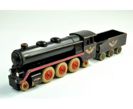 A Rare Pull-Along, approx 0 Gauge, Black Wooden Steam Locomotive with Tender. Still a bright item of vintage refined characte