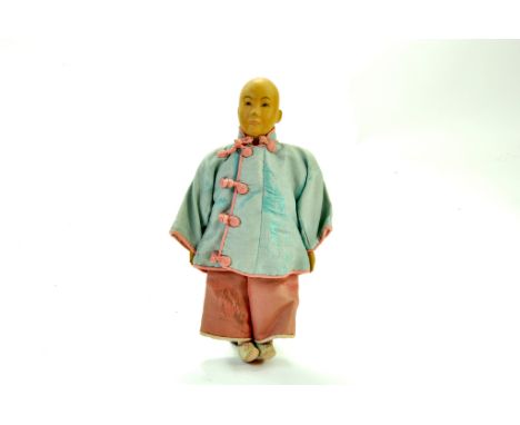 Scarce 7 ½ ” Antique Door of Hope Missionary Doll, Early 1900's. The doll’s clothing is handmade and very detailed, with embr