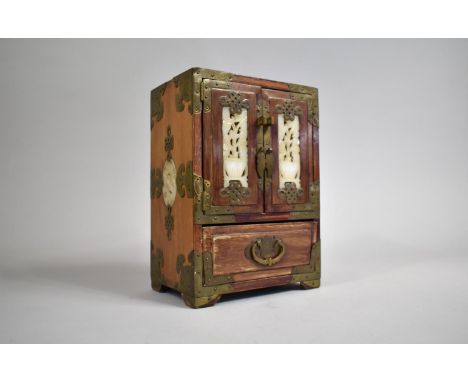 A Mid 20th Century Brass Mounted Chinese Collectors Cabinet, the Hinged Panelled Doors with Faux Jade Pierced Panels to Three