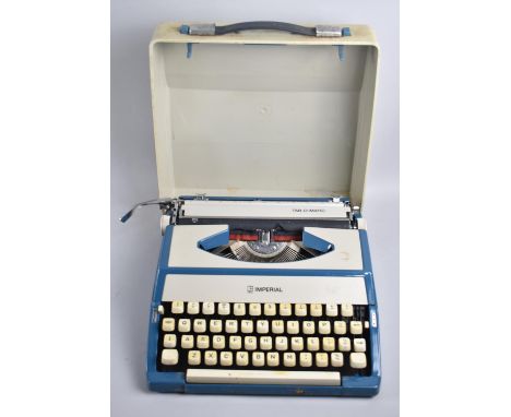 A Vintage Imperial Tab-O-Matic Manual Portable Typewriter 