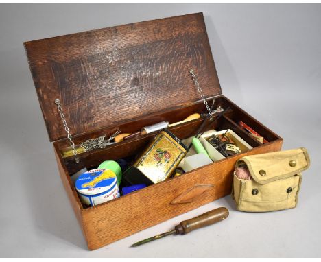 An Early 20th Century Oak Lift Top Sewing Box Containing Various Wools, Thimbles, Tools, Tape Measures and Other Equipment, 5