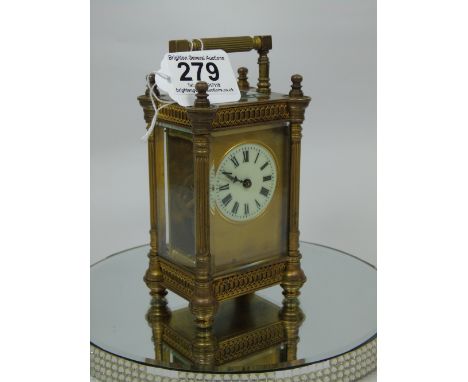 FRENCH ANTIQUE CARRIAGE CLOCK BRASS CASE, REEDED COLUMNS & HANDLE & TURNED FINIALS, BLIND FRETWORK PANELS WITH KEY  