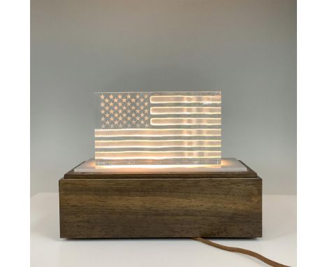 A crystal flag along with an Excelsior display box lamp. The flag is meant to sit on top of the box lamp for an illuminating 