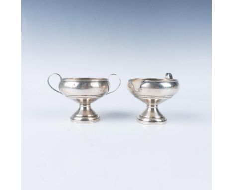 A charming set of sterling silver creamer and sugar bowl. Each marked, MSW Weighted Sterling. Largest measures 5"L x 3.5"W x 