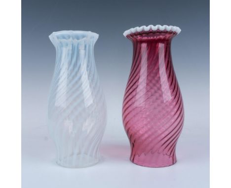 These two lamp covers feature beautiful ruby glass with a white ruffled crest and an opalescent base in swirled glass. The la