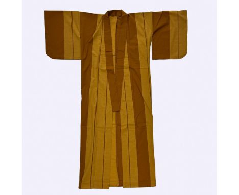 An ocher, breathable robe with a printed stripe pattern, known as a yukata, is typically worn after a bath or as a casual sum