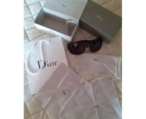 Christian Dior-A pair of brown mock tortoiseshell oversized sunglasses with branded sunglasses bag, boxes, merchant bag and c