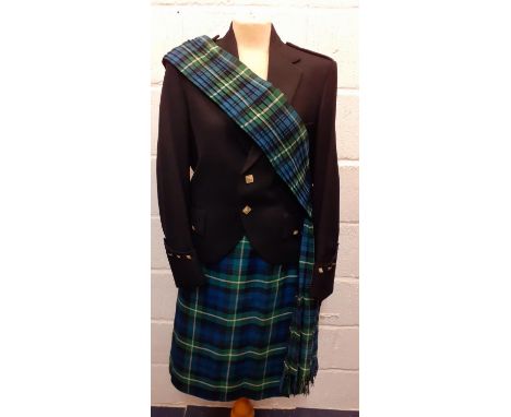 A green and blue tartan ladies kilt together with a ladies black evening jacket  having Scottish Lion Rampart peter Highland 