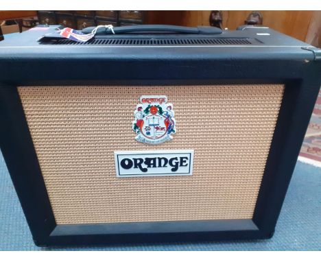 An Orange electric amplifier with integral Celestian G12 loudspeaker. Location:A2F 