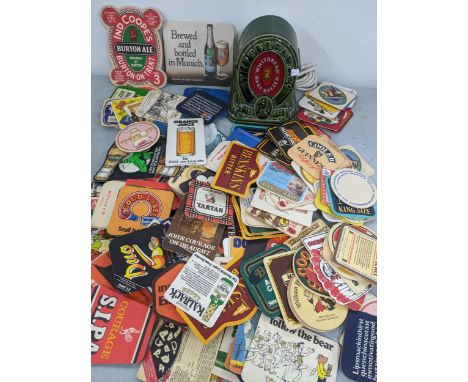 A Whitbread & Co advertising beer light together with a selection of beer matsLocation: 