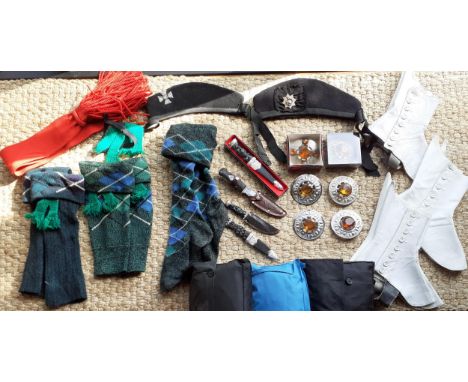 Scottish Piper Interest-Mixed clothing and accessories to include 4 dirks (daggers), 6 plaid brooches with citrine coloured c