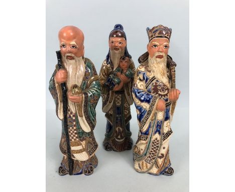 Oriental Ceramics, Three Chinese wise  Immortal figures Fuk, Luk, Sau, in Ming style enamel glazes with painted faces and han
