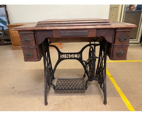 Singer sewing machine table with integrated sewing machine on Iron base with original Singer manual dated 1906