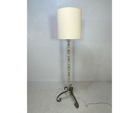 Standard lamp base of fluted glass sections supported by 3 Iron scroll legs 