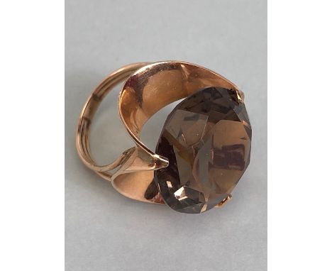 14kt stamped continental rose gold ring, set with a large round  smoky quartz approximately 10.3g total size R