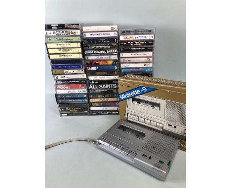 Vintage personal realistic Cassette tape recorder in box with instructions and a collection of over 50 cassette tapes, to inc