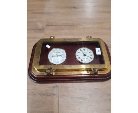 A BRASS CASED QUARTZ SCANDEX CLOCK AND BAROMETER