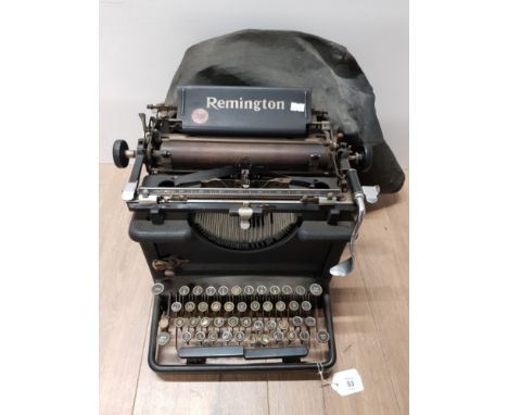 VINTAGE REMINGTON TYPEWRITER WITH COVER