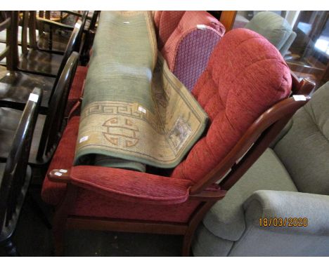 TEAK FRAMED RED UPHOLSTERED AND BUTTON BACK ARMCHAIR