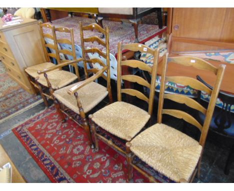 Five ladder back chairs