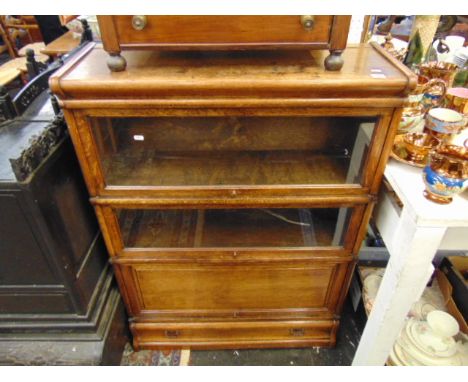 A three tier Oak Globe Wernick