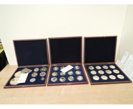 Three Windsor Mint Medallion and Decorative Coin sets, Winston Churchill 9 Item set with cert 0002, History of Aviation 12 Cr