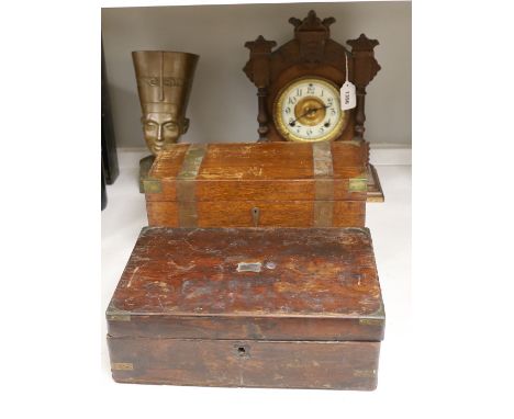 A brassbound box, a writing slope, a mantle clock, 37.5cm tall, and a bust of Nefertiti