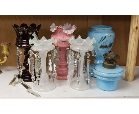 A pair of Victorian lustres two others and an oil lamp, tallest 26cms high