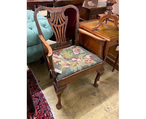 A George III provincial elm seat elbow chair with tapestry upholstered drop in seat, width 66cm, depth 47cm, height 94cm