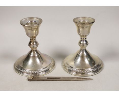 A pair of sterling mounted dwarf candlesticks, 11.9cm and a pair of modern silver compass dividers, maker, LP, London, 1990, 