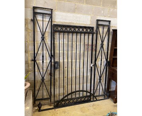 A painted cast iron gate with bowed top section, approx. width 190cm, approx. height 248cm