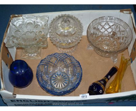 A box of pressed glass bowls, vases, blue bowl, Czech blue and gold bud vase, yellow celery vase.