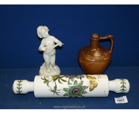 A Portmeirion passion flower rolling pin (chipped,) a blanc-de-chine figure of cherub playing an instrument 7½" tall, a salt 